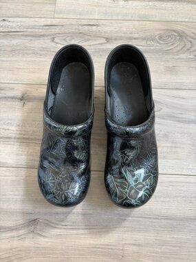 Dansko Black Floral-Print Clog with Teal Accents